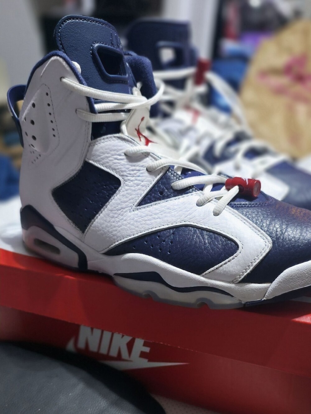 Nike Air Jordan 6 Retro "Olympic" sneakers, recognizable by their white leather